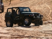 ladd_climbing_slickrock