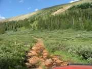 red_rocks_and_water